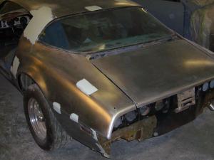Car stripped to bare metal